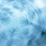 Branches from threes is reaching for the blue winter sky